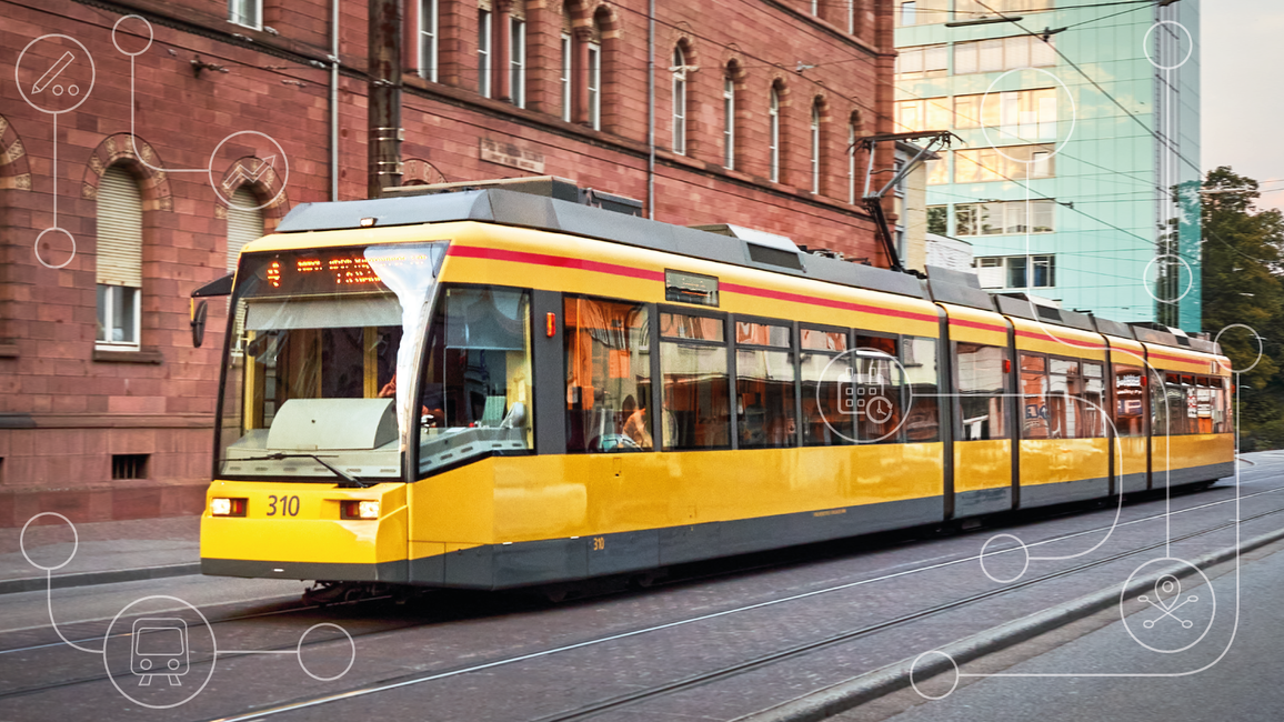A tram in front of a house front; the picture shows symbols indicating networked data