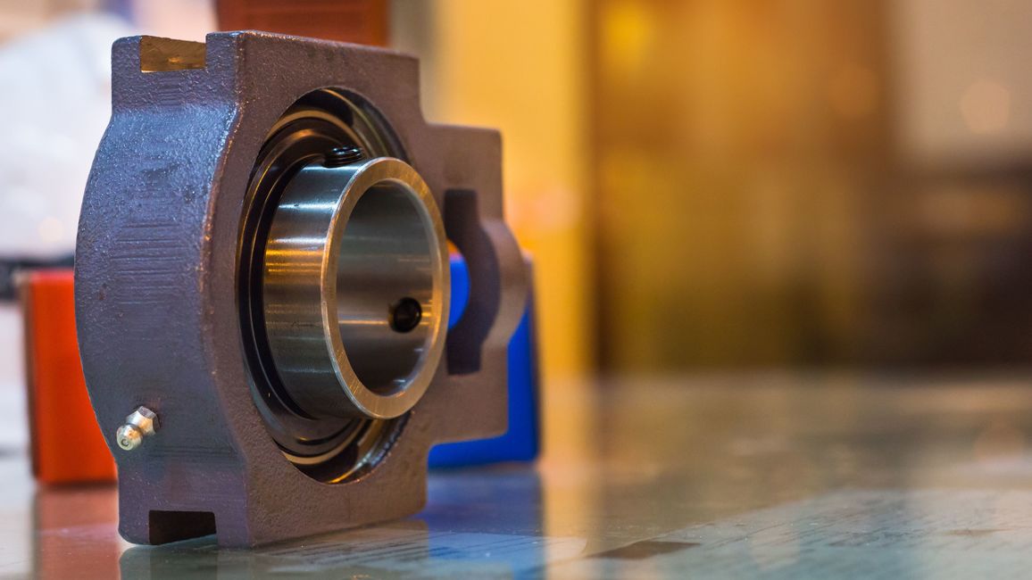 A conventional machine bearing, dismounted and presented on a table